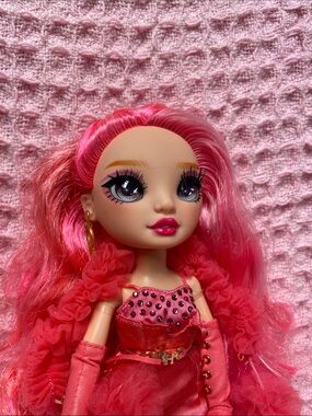 Rainbow High -  Stella Monroe Fashion Doll with Long hot pink hair.